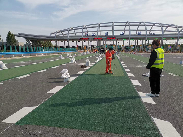 三艾斯彩色防滑路面在鄭州南收費(fèi)站鄭港 ETC 專用通道項(xiàng)目中的成功應(yīng)用